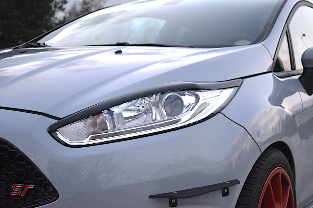 Maxton Design Scheinwerfer Blenden Böser Blick passend für V.1 Ford Fiesta ST / ST-Line / Standard Mk7 FL schwarz Hochglanz